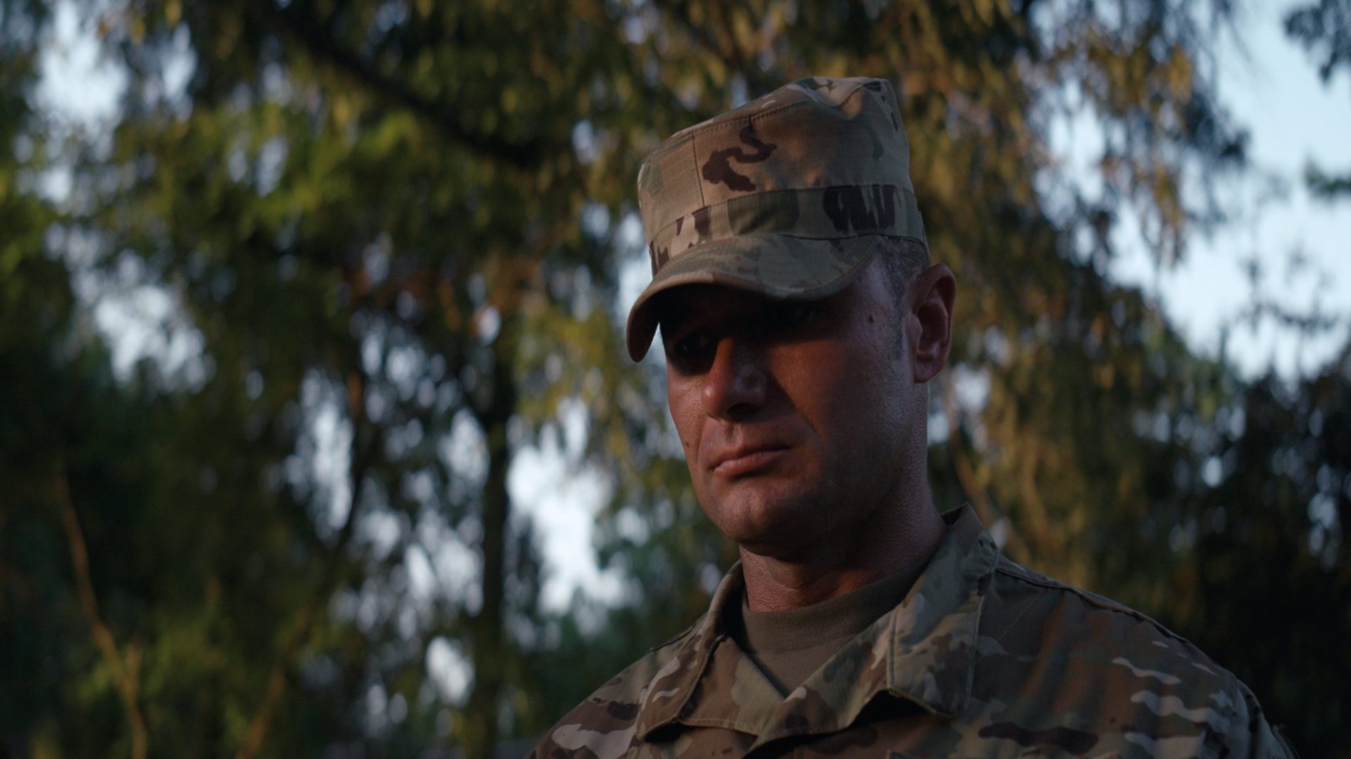 A uniformed service member outdoors during H.O.O.V.E.S.: Healing Our Veterans.