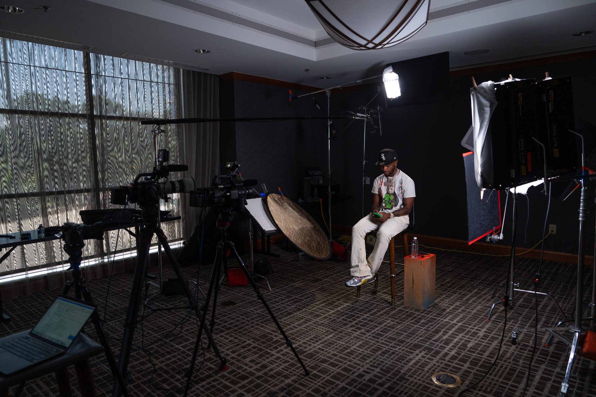 Cameras, lighting and sound equipment arranged for a TOOSII interview filmed through JPA.